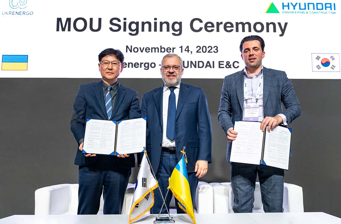 MOU signing between Hyundai E&C and Ukrenergo Picture of MOU signing between Hyundai E&C and Ukrenergo. SVP Choi Young of New Energy Business Unit of Hyundai E&C (left) German Galushchenko, Minister of Energy of Ukraine (center), and Volodymyr Kudrytskyi, President of Ukrenergo (right), are taking a group photo after signing the MOU on new construction and repair of transmission and transformation infrastructure in Ukraine.